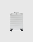 Apollo S Passenger Overhead suitcase in anodized aluminum with four wheels, 57cm height for advanced durability.