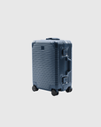 The Signature Series S Advanced Navy suitcase with a streamlined design and TSA-approved locking system.
