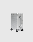 Apollo S Passenger Overhead suitcase in anodized aluminum, featuring larger wheels for enhanced maneuverability.