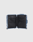 Open interior view of The Signature Series S 'Advanced' Navy carry-on suitcase with black lining and compartments.