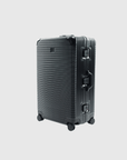 The Signature Series L "Advanced" Black luggage, 110L capacity, zipless design, sleek ribbed texture, robust wheels.