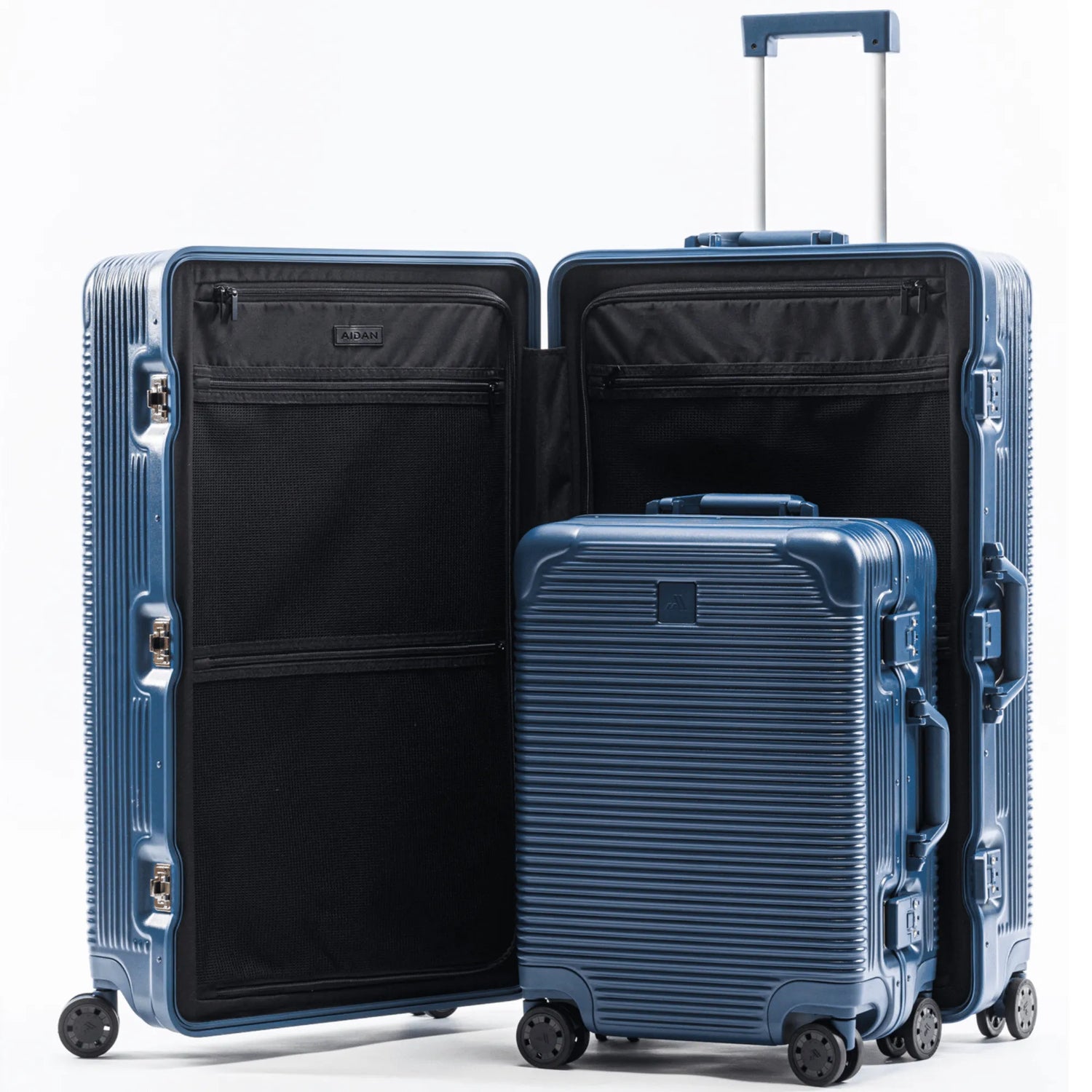 Stylish blue luggage set with opened suitcase and carry-on, featuring durable design and spacious interior.