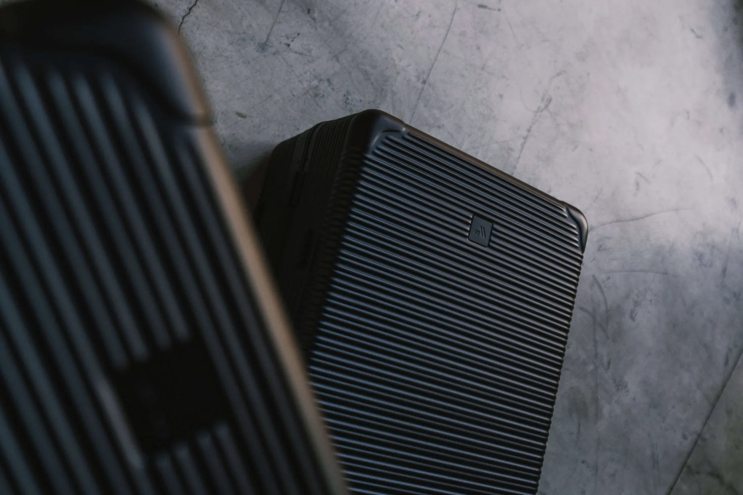 Close-up of the Signature Advanced Cases featuring a sleek, ribbed design in a stylish black finish.
