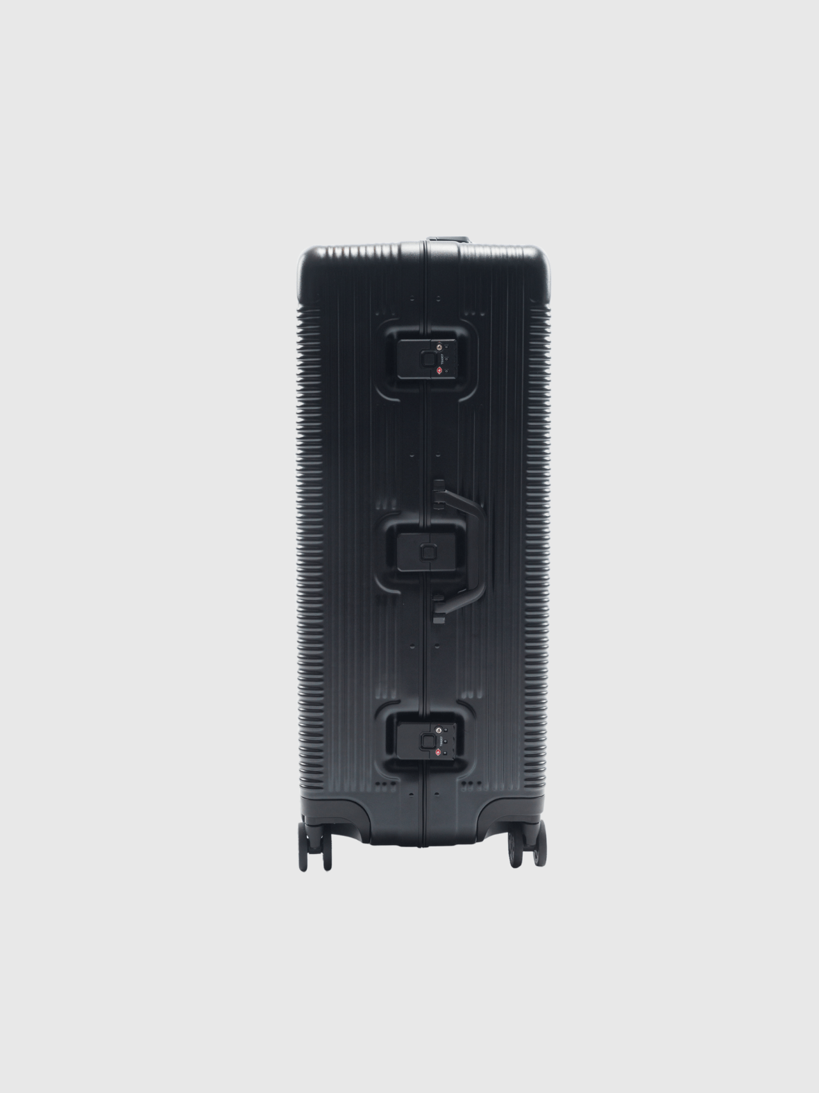 The Signature Series L "Advanced" Black suitcase, showcasing its sleek design and robust zipless closure.