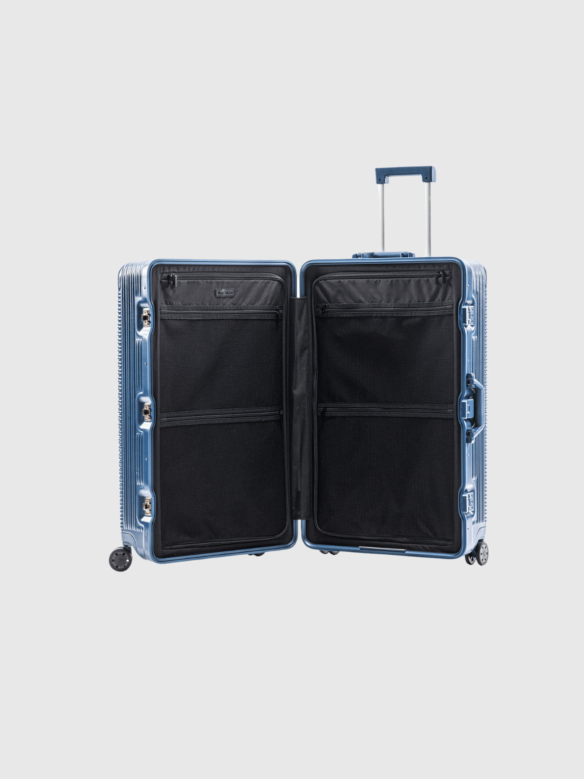 Interior view of The Signature Series L 'Advanced' Navy suitcase, showcasing spacious compartments and sleek design.