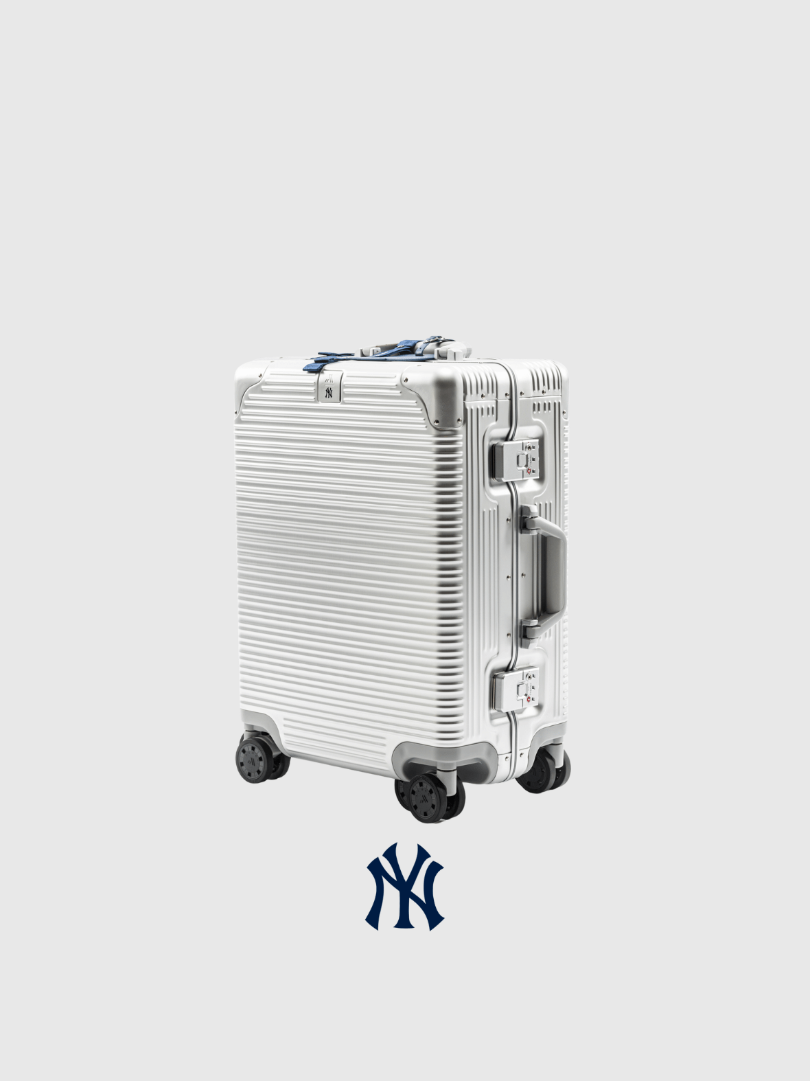 New York Yankees time capsule limited edition suitcase in white with ribbed design and logo.