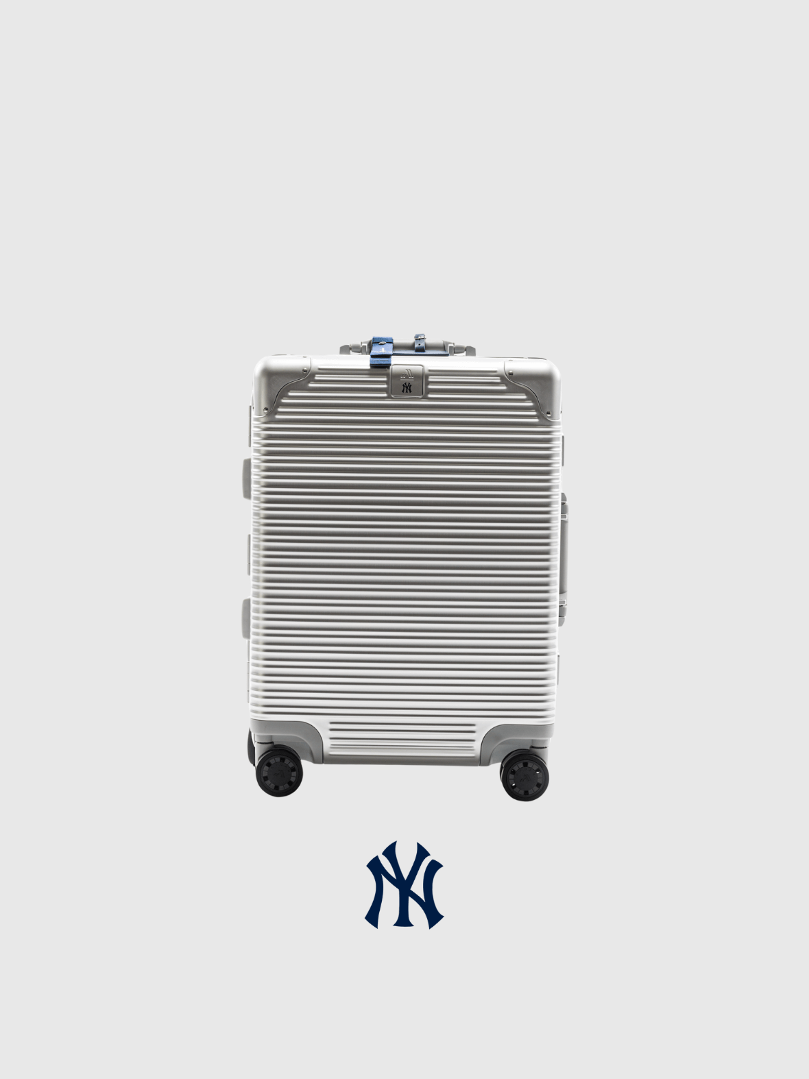 New York Yankees limited edition suitcase featuring luxury design and rolling wheels.