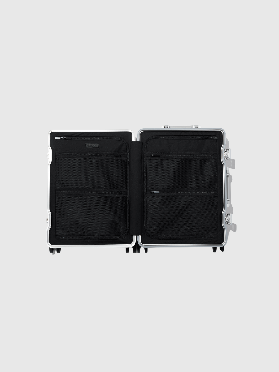 Open view of the Apollo S Passenger Overhead suitcase showcasing black interior with multiple pockets.