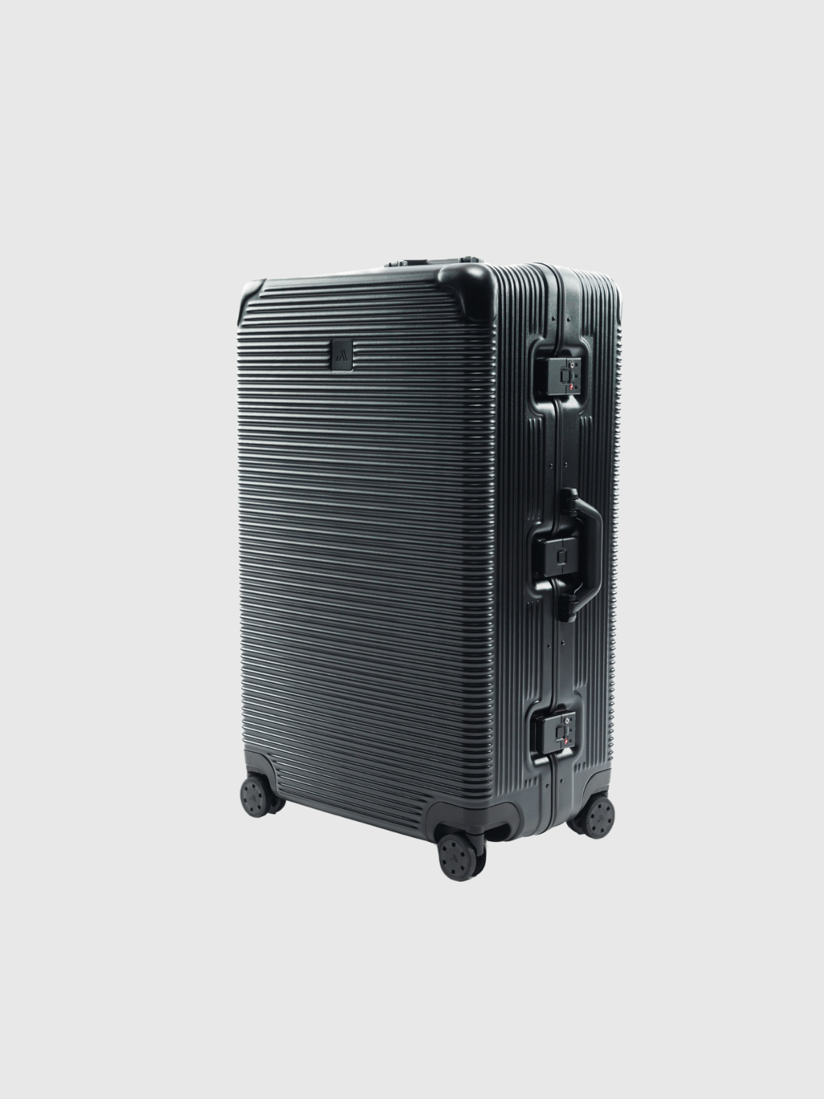 The Signature Series L "Advanced" Black luggage, 110L capacity, zipless design, sleek ribbed texture, robust wheels.